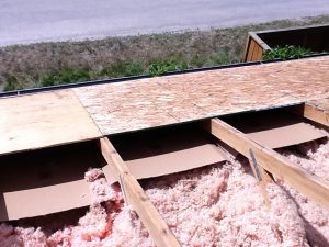 Airflow repair work showing ventilation improvements on residential roof