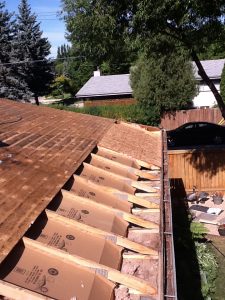 Roof airflow project showing shingle and ventilation installation