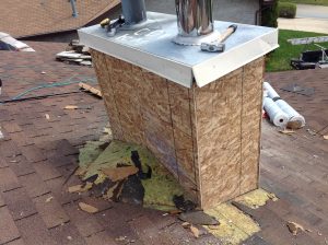Chimney repair work showing restoration in progress
