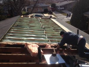 Westwood project worker installing new roof components
